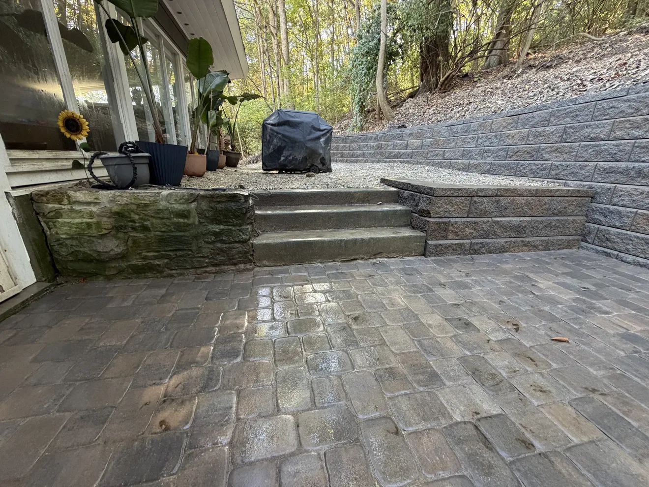 Paver patio leading to block steps and the landing at the back door in Cincinnati, OH