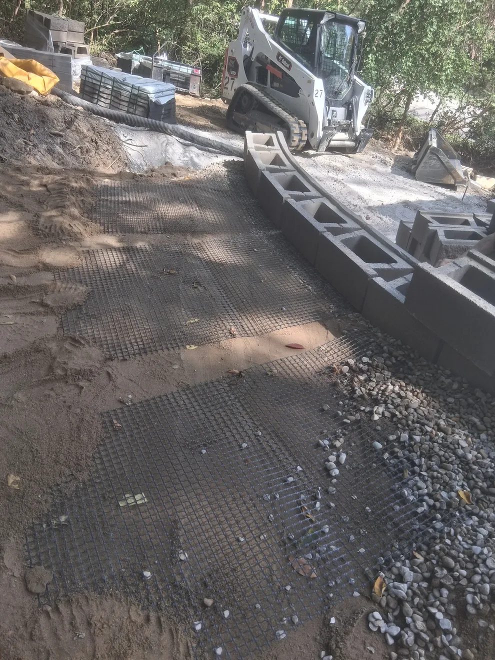 Geogrid sheets over compacted fill behind the block wall in Cincinnati, OH