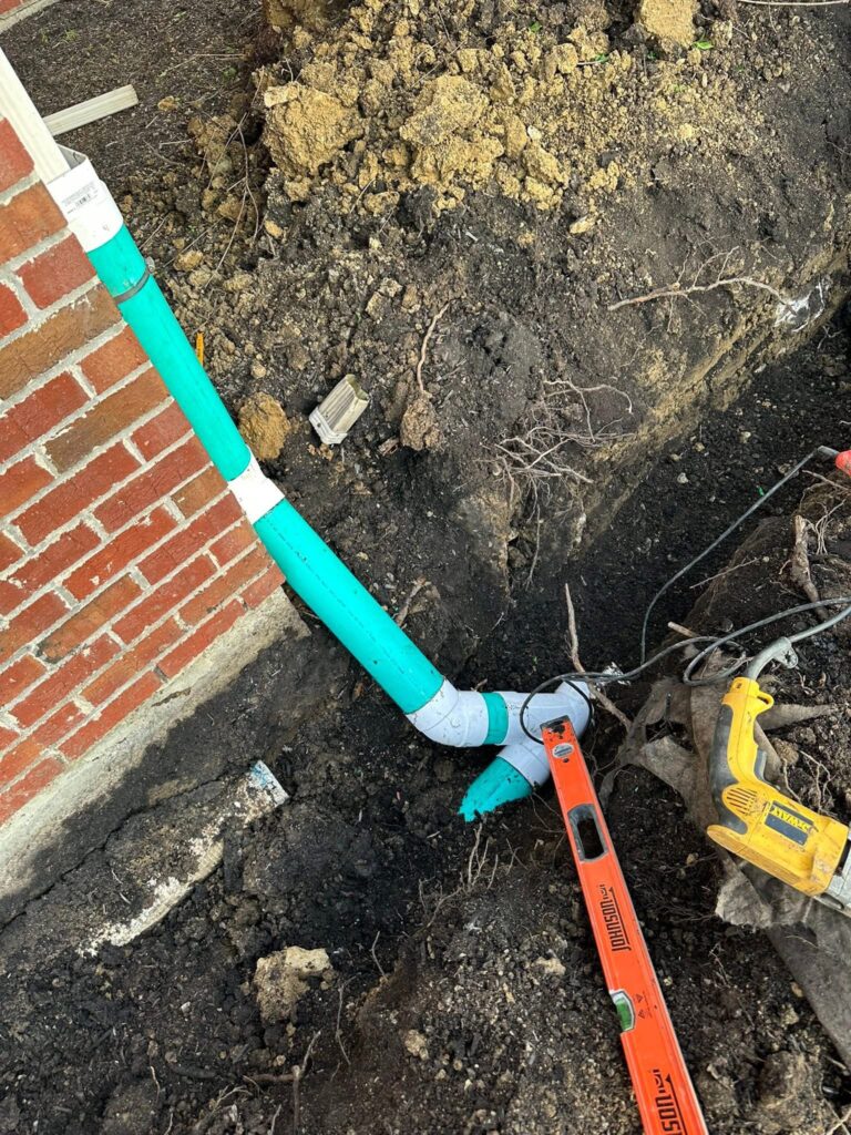 Drain installation in progress at Frye Park Circle by Shawn’s Landscape & Design in Mason, Ohio.